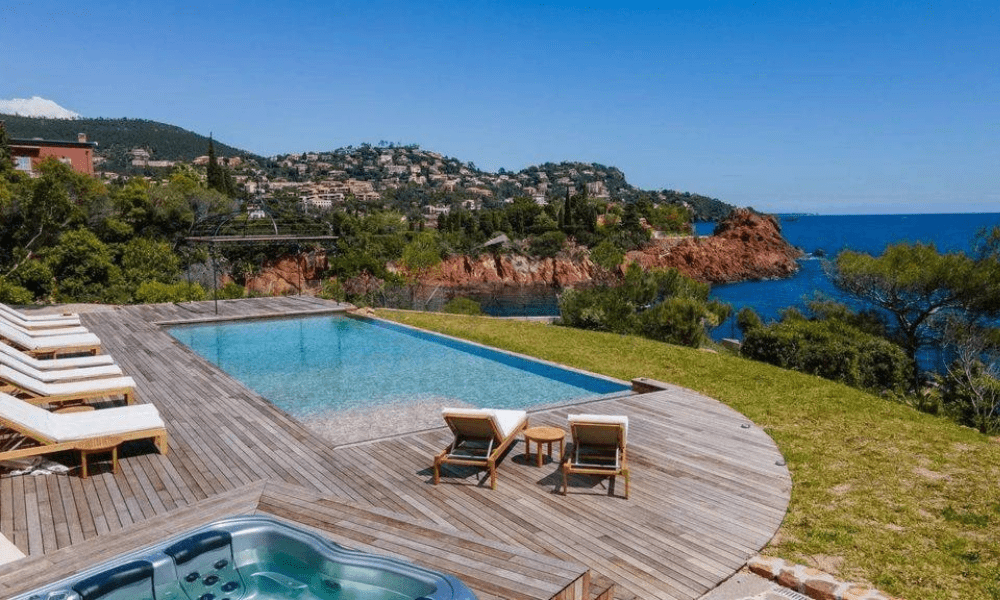 Evening exterior of Villa Romarine illuminated by sunset glow